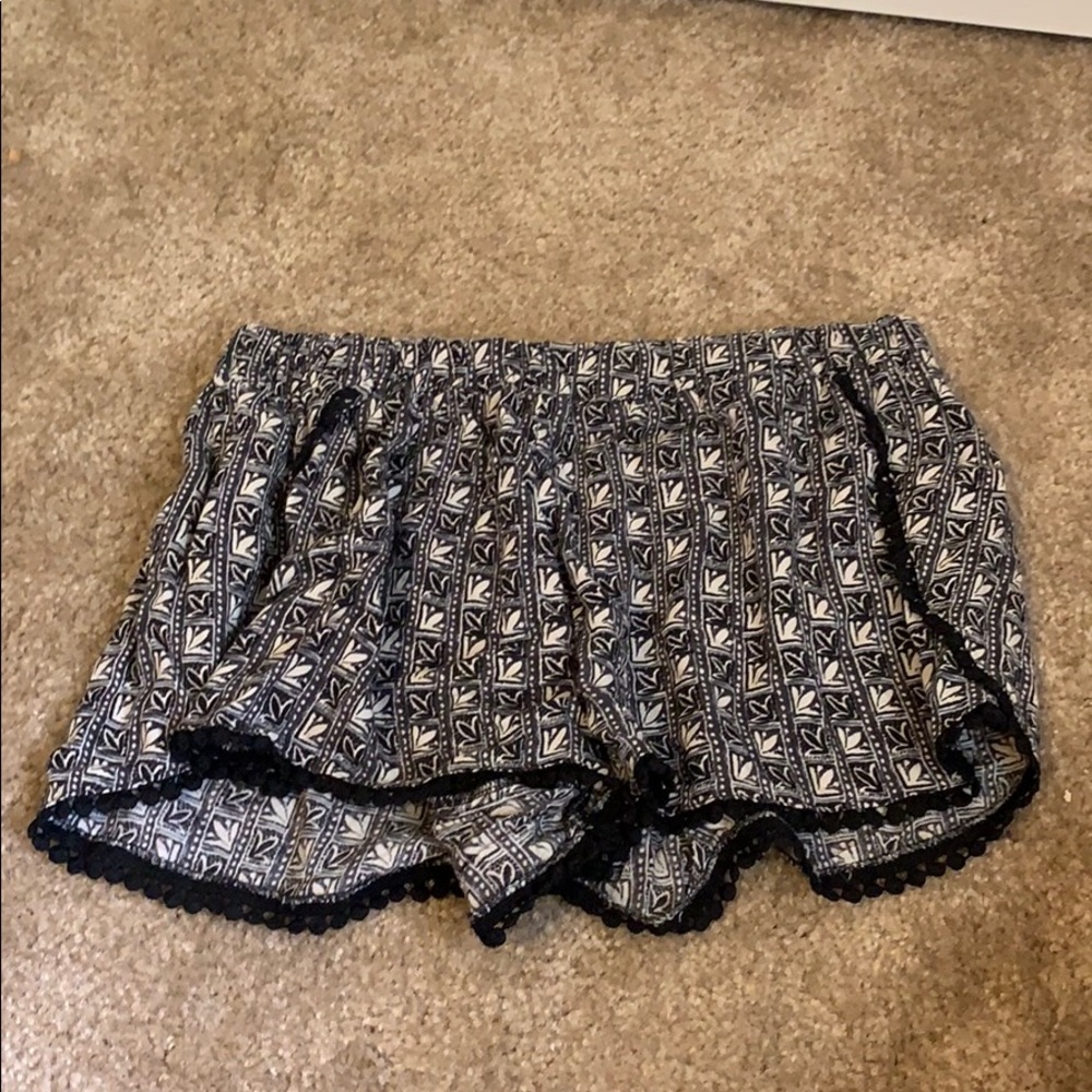 Loose black and white fabric shorts